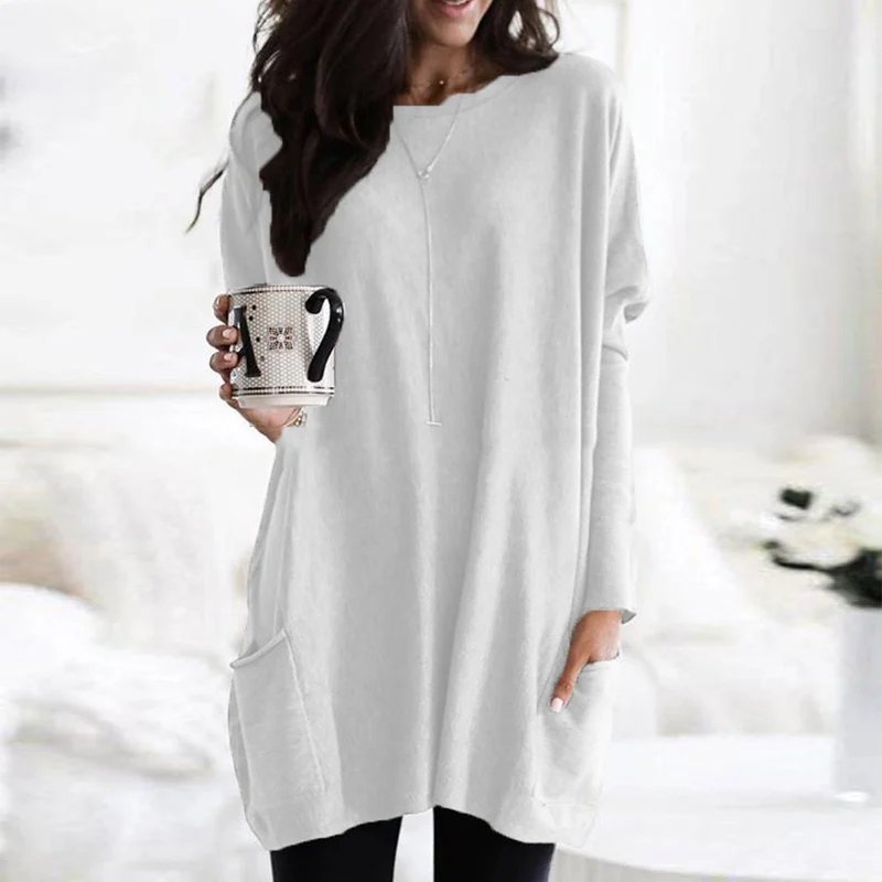 Cozy women's oversized long sleeve tunic top, perfect for cooler casual days or lounging at home.