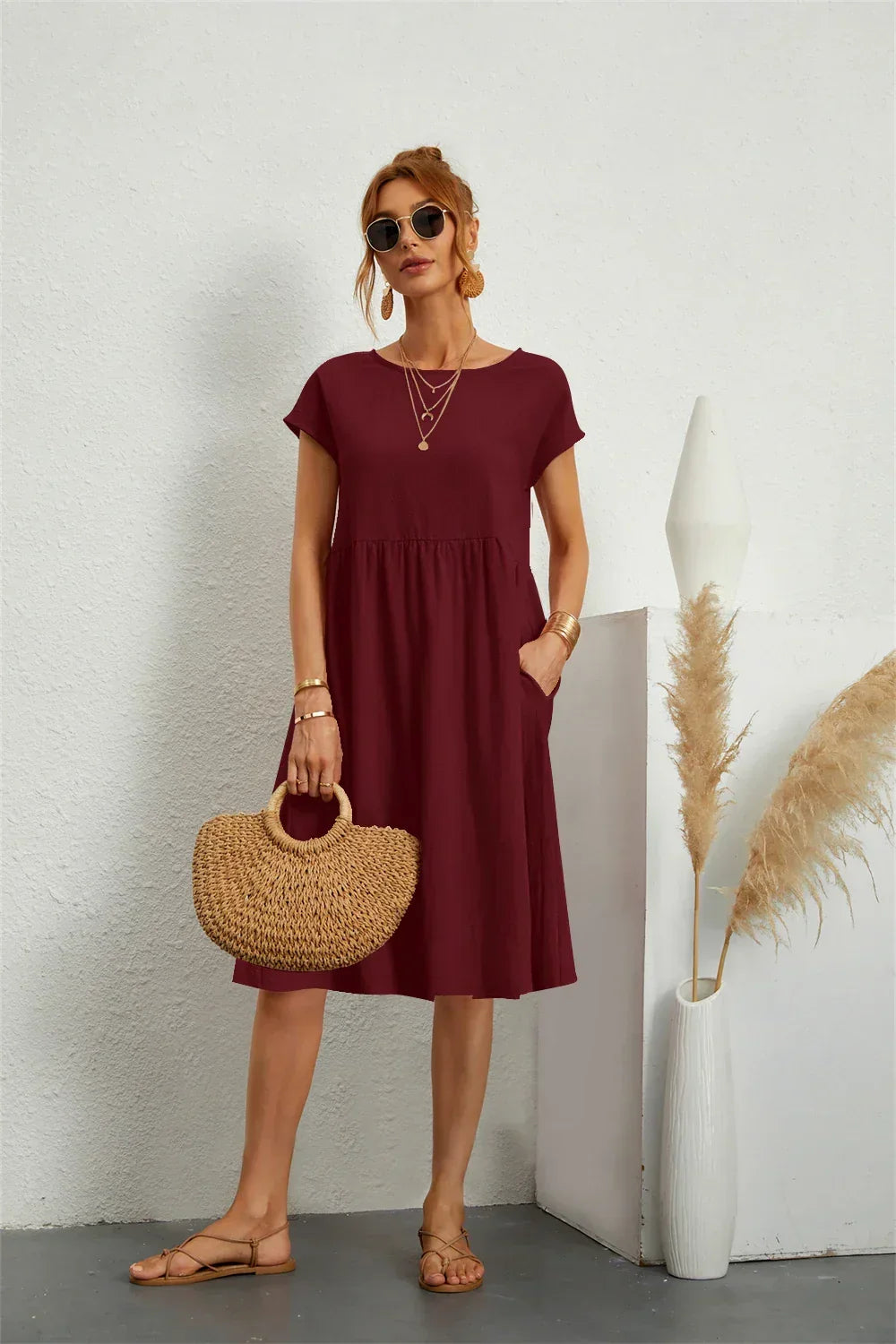 Relaxed fit midi dress for women, a pocketed, versatile casual style perfect for summer days.
