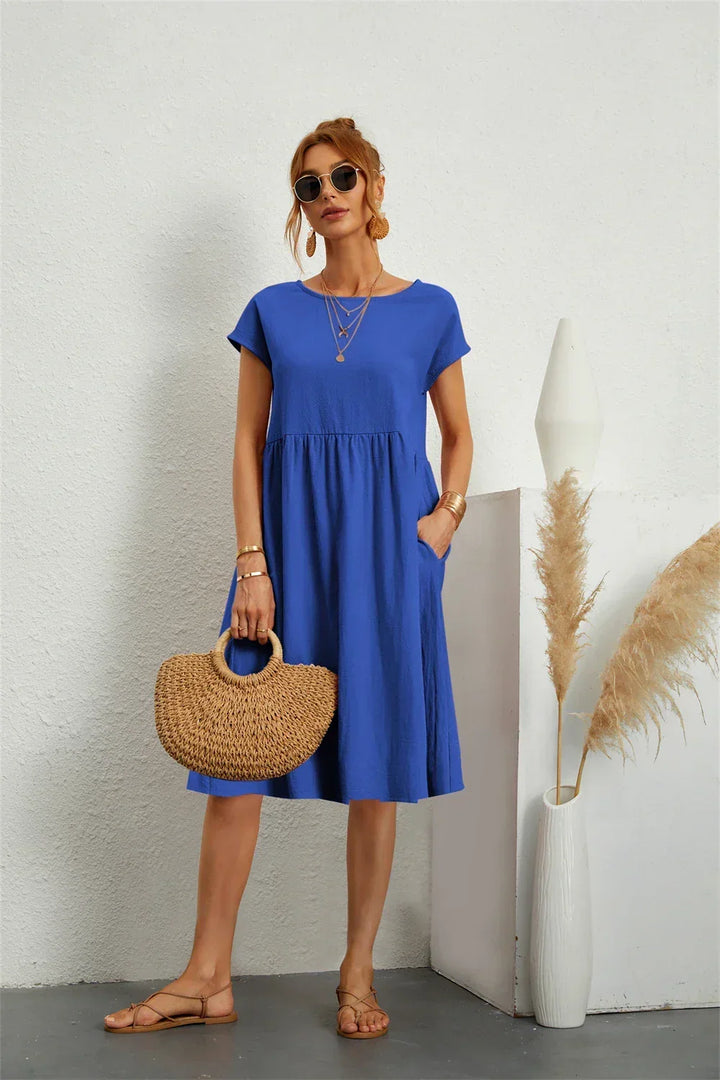 Everyday casual midi dress for women, featuring practical pockets and an effortless, comfortable design.