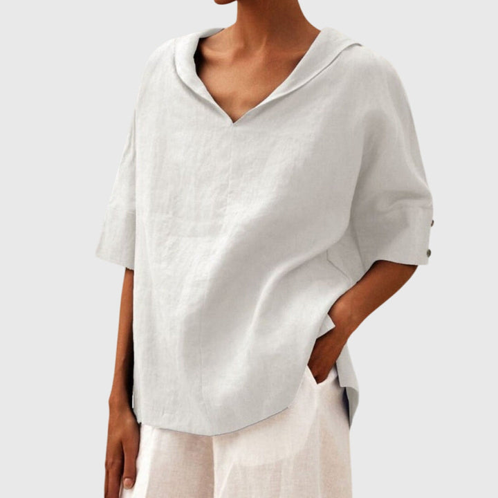 Chic women's long sleeve relaxed fit blouse, versatile for spring & summer casual or everyday fashion.