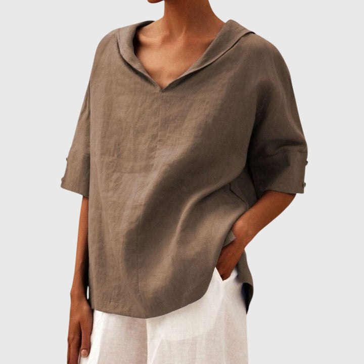 Comfortable women's relaxed fit blouse with flowing fabric, ideal for effortless spring and summer styling.
