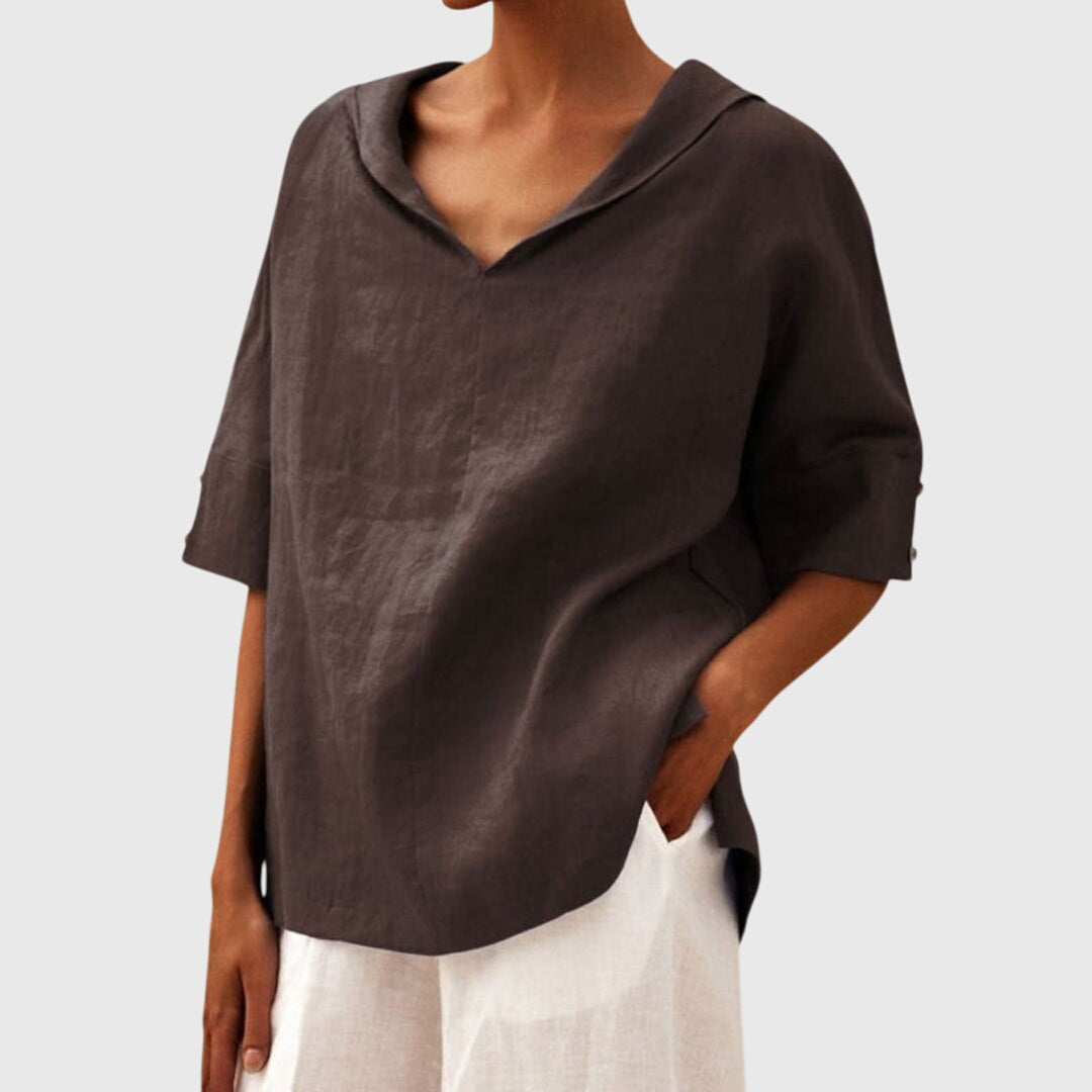 Stylish women's relaxed fit top for everyday fashion. A comfortable, versatile long-sleeve blouse.