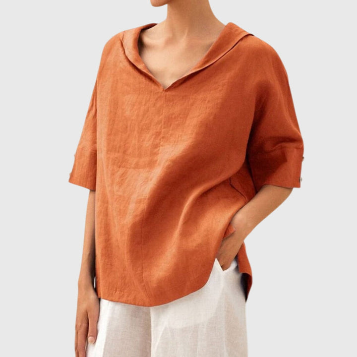 Effortless chic: women's relaxed fit blouse, a comfortable long-sleeve top for versatile everyday fashion.