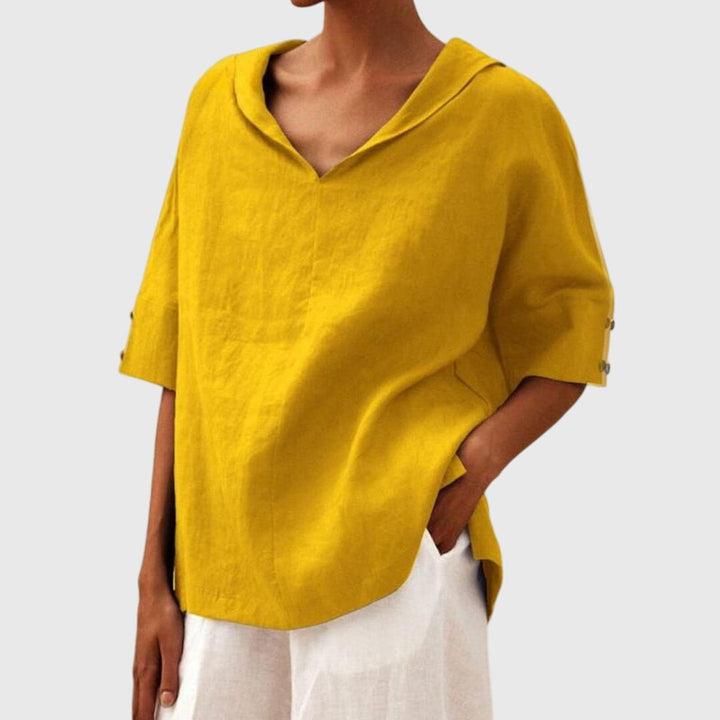 Versatile women's everyday blouse, featuring a comfortable relaxed fit and long sleeves, perfect for casual chic.