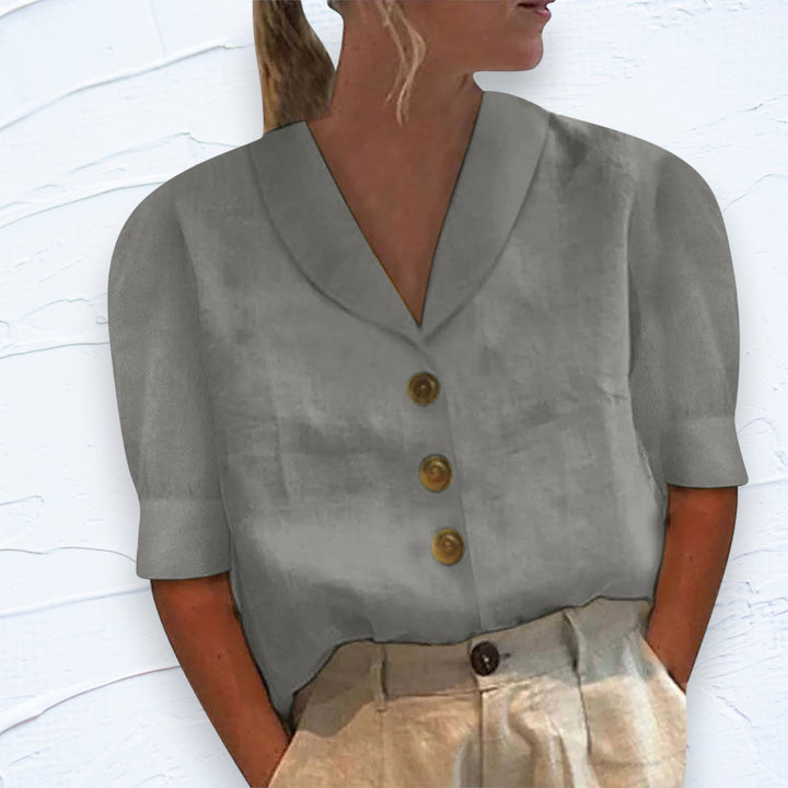 Comfortable women's relaxed fit short sleeve shirt with button front for easy everyday styling.