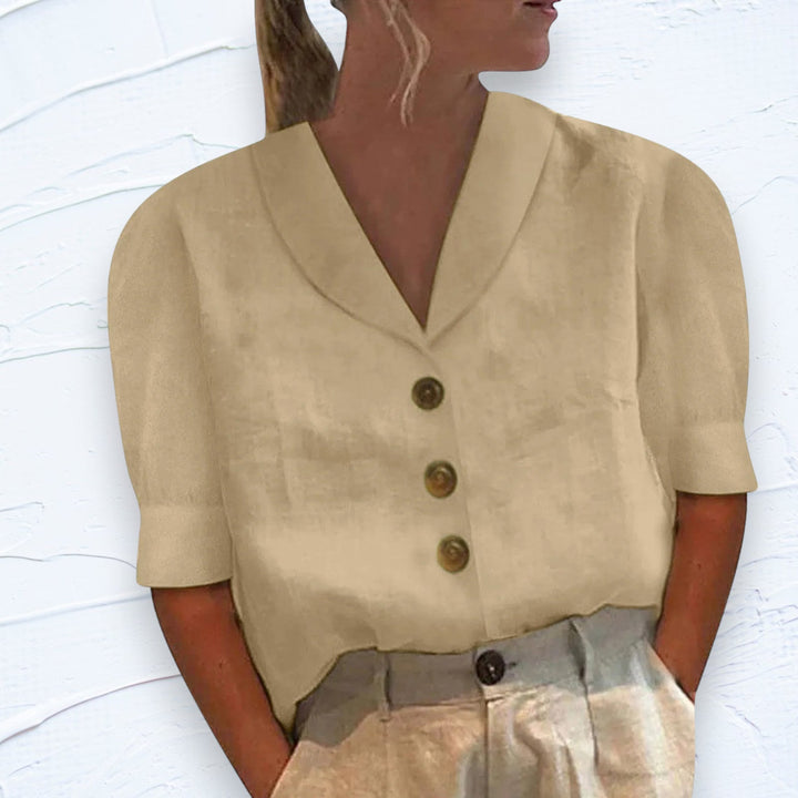 Effortless short sleeve button-front shirt, a chic summer top for relaxed casual wear.