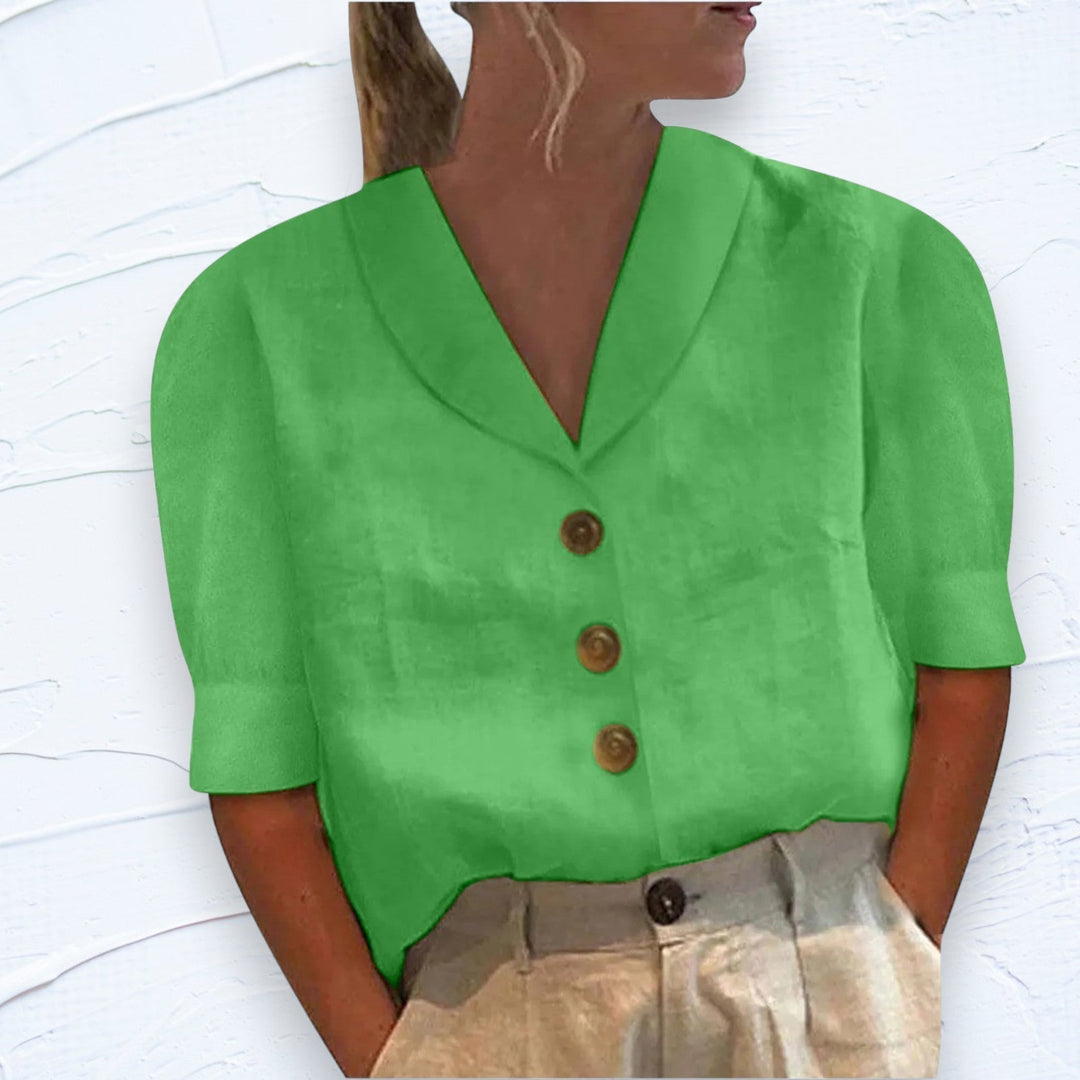 Casual women's short sleeve button-front top, ideal for comfortable everyday summer looks.