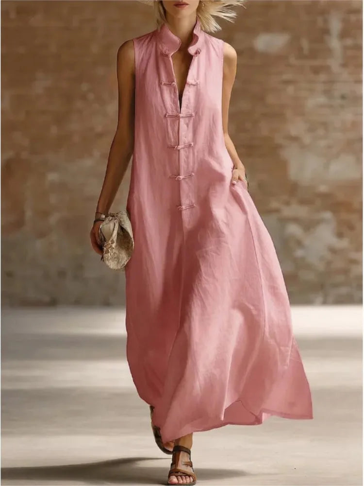 Comfortable women's flowing sleeveless maxi shirt dress, ideal for summer vacation and modest fashion.