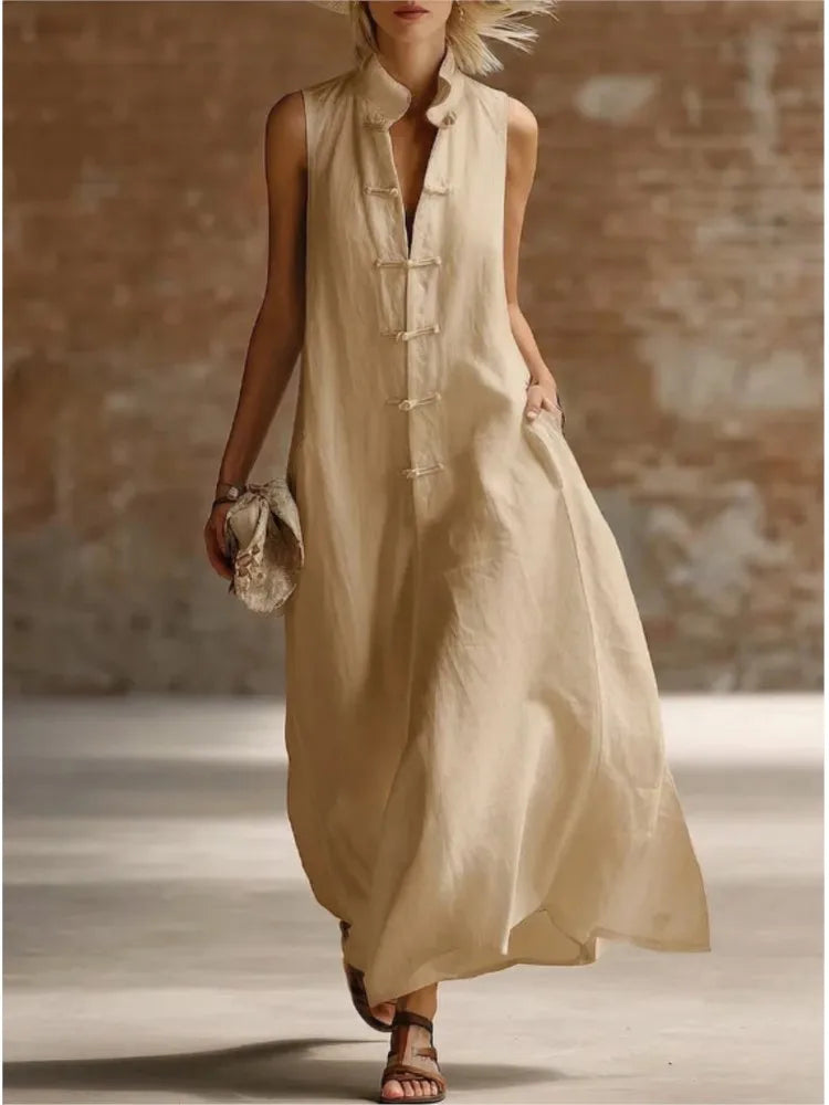Modest women's sleeveless maxi shirt dress, featuring a flowing design for comfort and elegant casual wear.