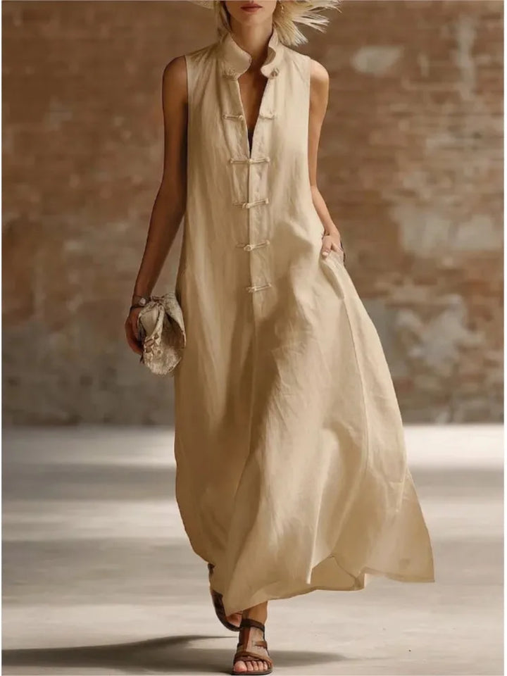 Modest women's sleeveless maxi shirt dress, featuring a flowing design for comfort and elegant casual wear.