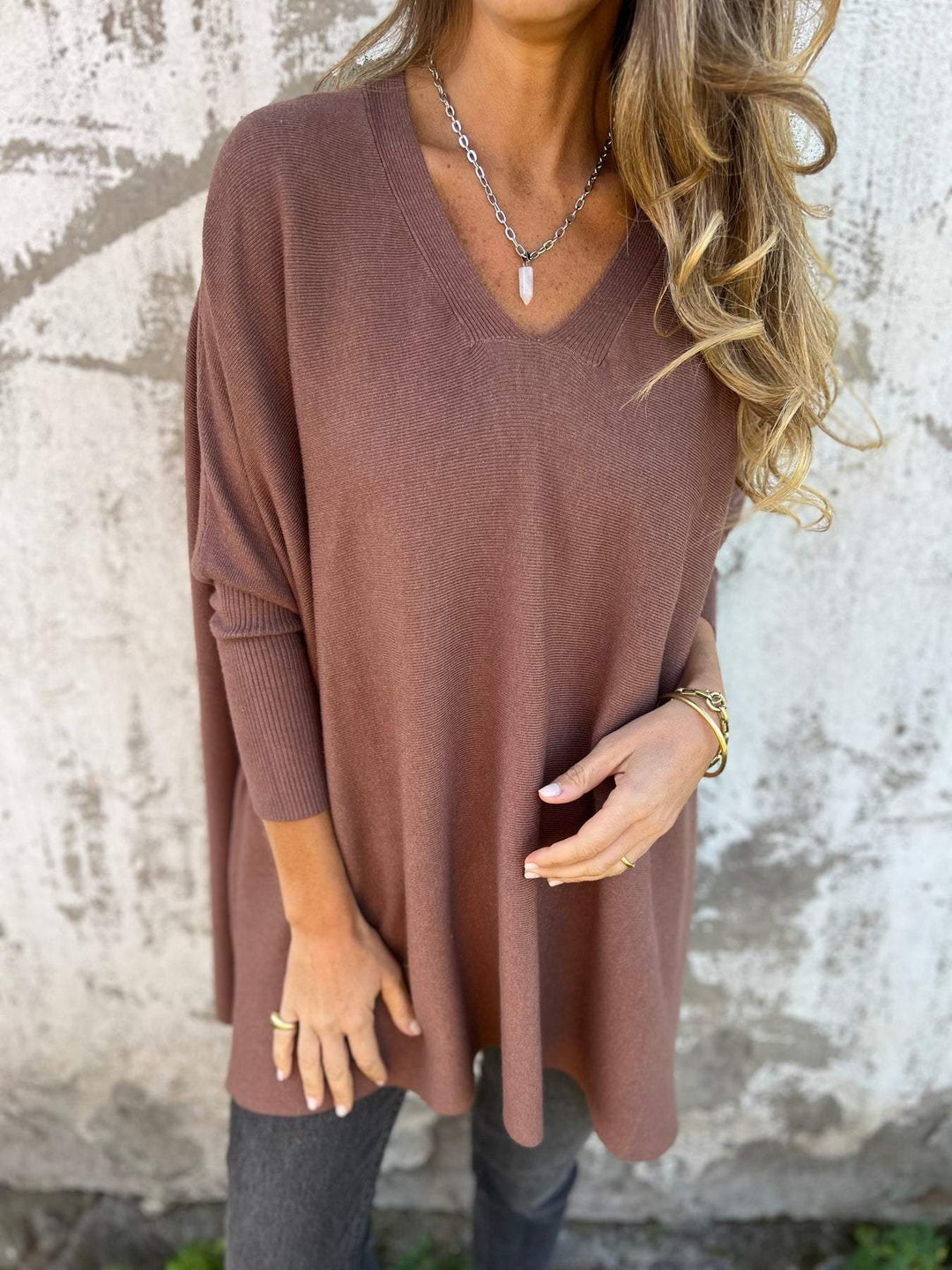 Effortless women's V-neck pullover tunic, long sleeve, soft, oversized swing fit. Versatile casual top.