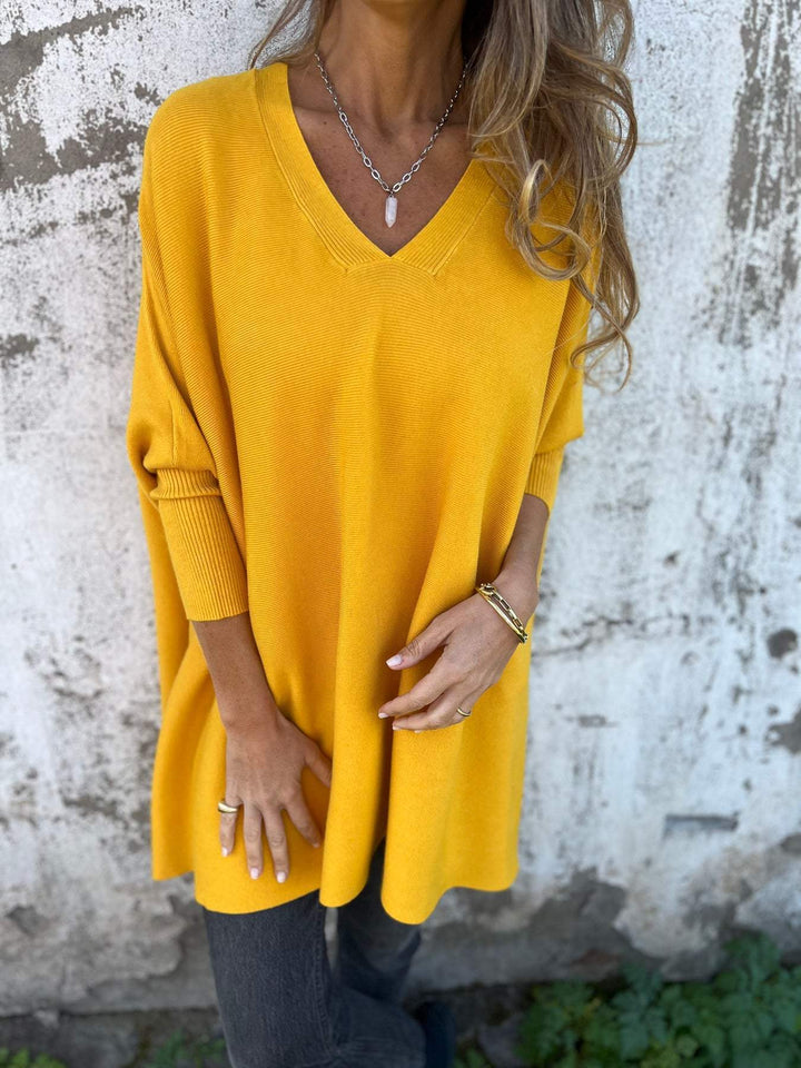 Fall-winter women's V-neck swing pullover. Relaxed fit long sleeve tunic sweater, comfortable and versatile.