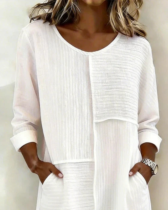 Comfortable textured midi shift dress for women, ideal for versatile everyday wear & relaxed summer fashion.