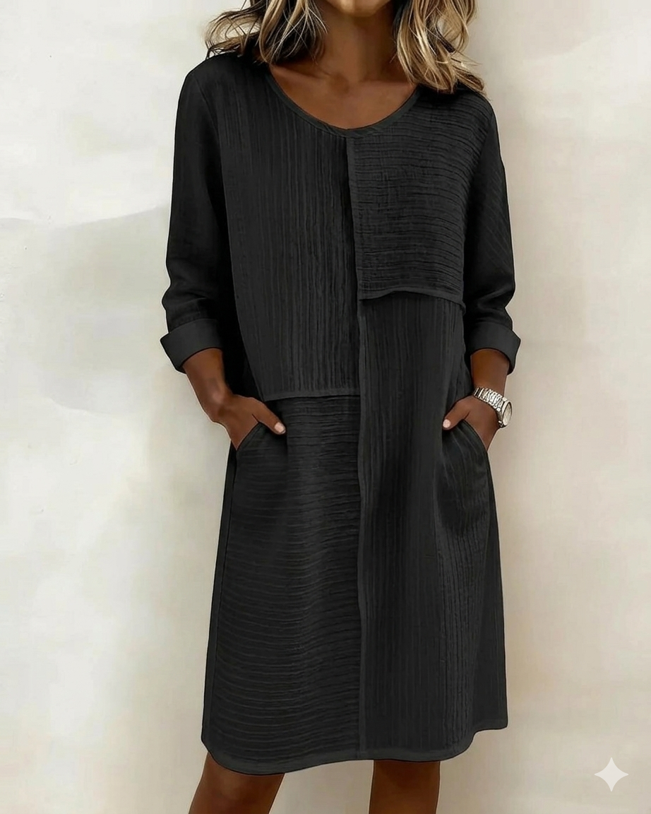 Stylish women's casual shift dress with practical pockets & a comfortable textured finish for effortless wear.