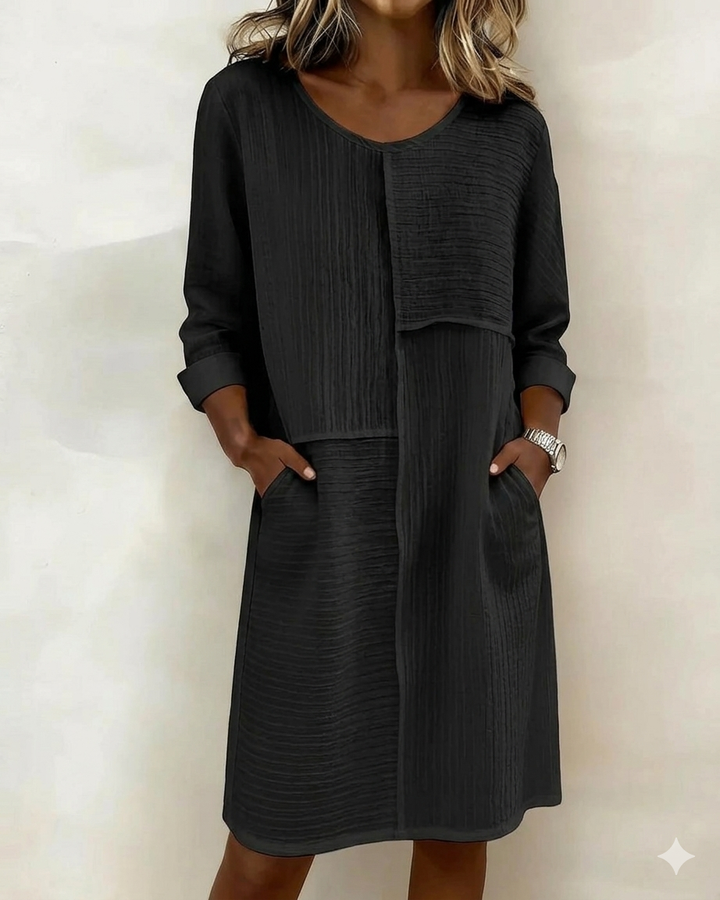Stylish women's casual shift dress with practical pockets & a comfortable textured finish for effortless wear.