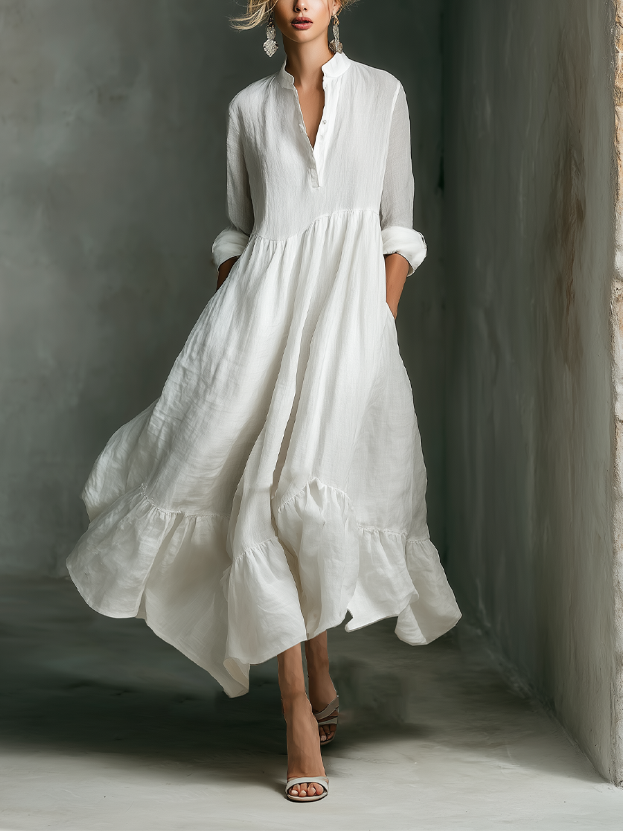 Women's Effortless White Maxi Dress with tiered skirt, long sleeves & stand collar. Perfect for casual summer resort wear.