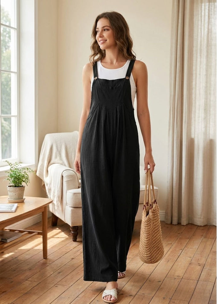 Women's effortless wide leg jumpsuit with adjustable straps & convenient pockets, ideal for summer casual wear.