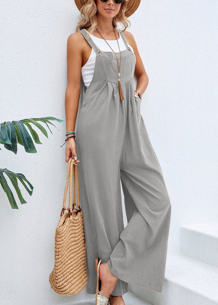Sleeveless women's wide leg jumpsuit, excellent for summer, with adjustable straps & essential pockets.