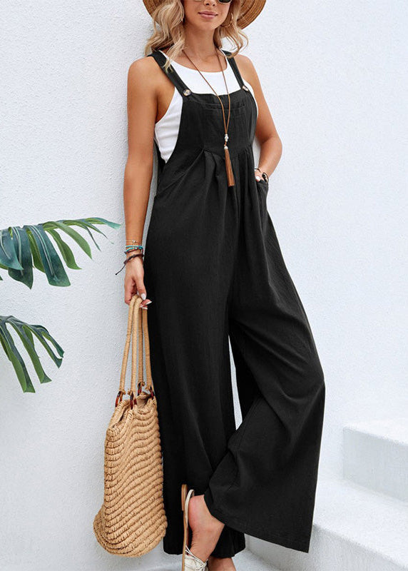 Effortless women's wide leg jumpsuit, perfect for casual outings, includes adjustable straps & pockets.