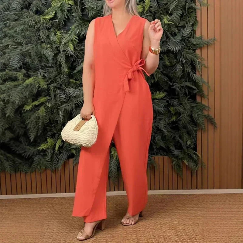 Women's effortless wide leg jumpsuit with wrap V-neck and tie waist for a versatile, elegant look.