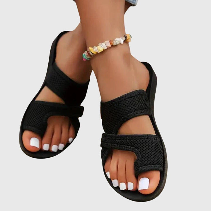 Comfortable women's elastic fit orthopedic sandals offering contoured arch support for foot pain relief.