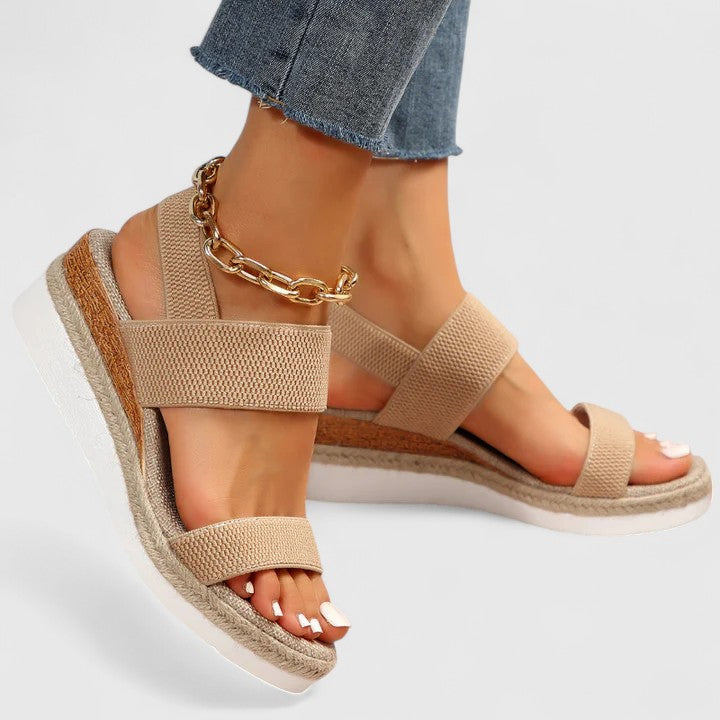 Women's elastic strap open toe espadrille wedge sandals. Comfortable summer slip-on footwear.