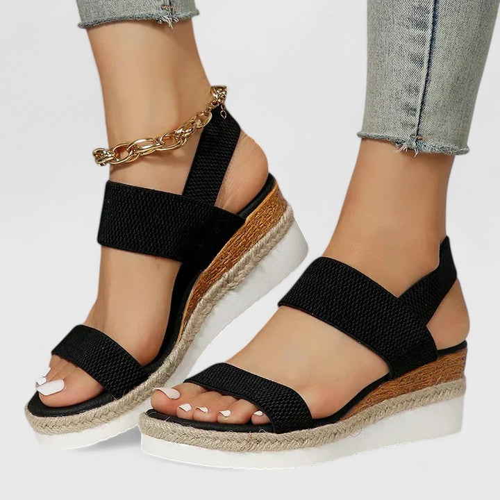 Stylish women's open toe espadrille wedge sandals with elastic straps, perfect for summer casual wear.