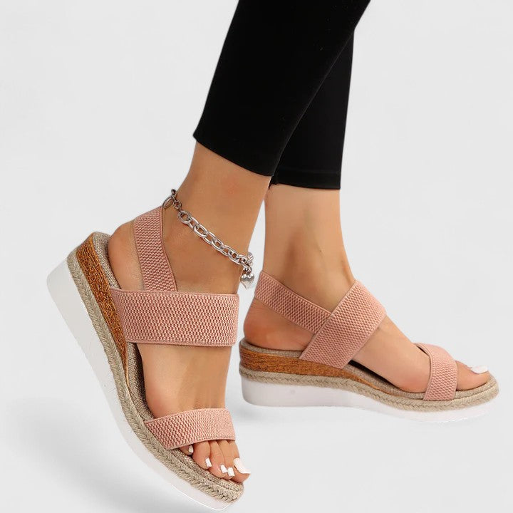 Women's versatile open toe espadrille wedge sandals, showcasing elastic straps & a comfortable slip-on design.