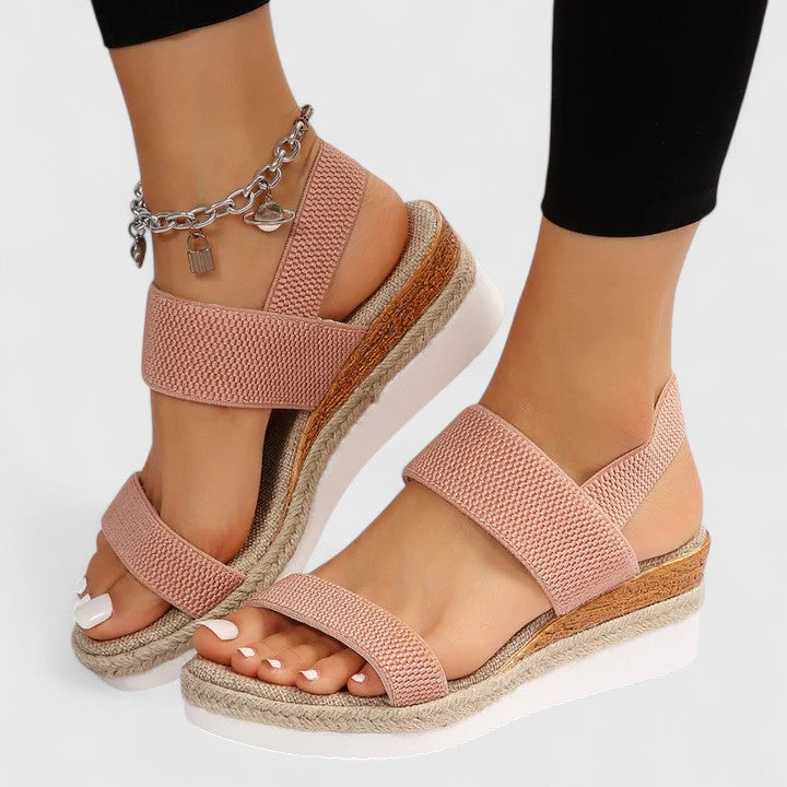 Women's espadrille wedge sandals, perfect with summer dresses. Open toe, elastic straps, comfortable slip-on footwear.