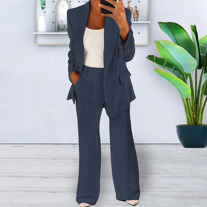 Formal women's pantsuit: a sleek blazer paired with elegant wide-leg trousers for a chic professional style.