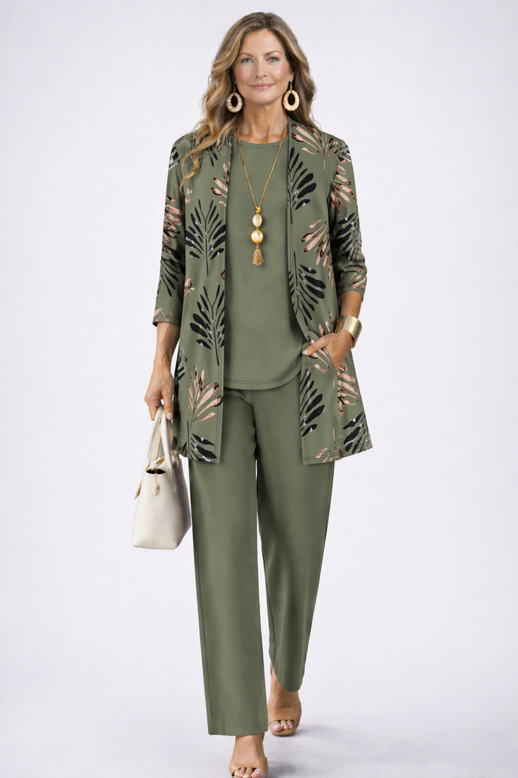 Women's elegant 3-piece set: stylish blazer, matching top, & relaxed trousers. Perfect for office or smart casual.