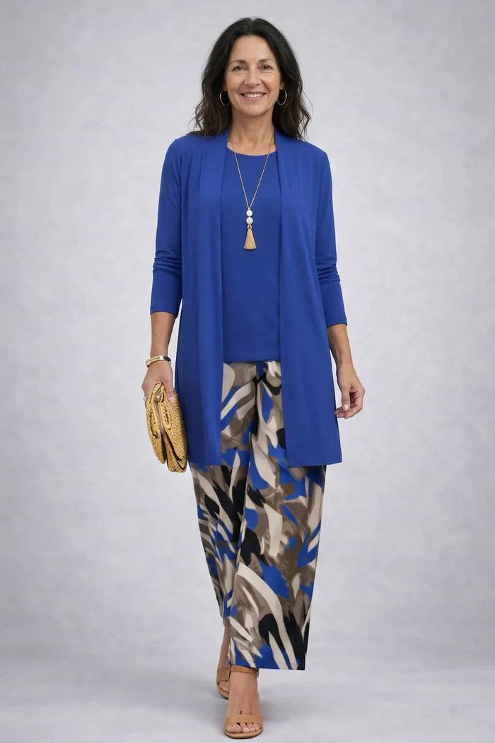 Coordinated women's 3-piece blazer set with a sleek top & comfortable relaxed trousers. Modern office wear.
