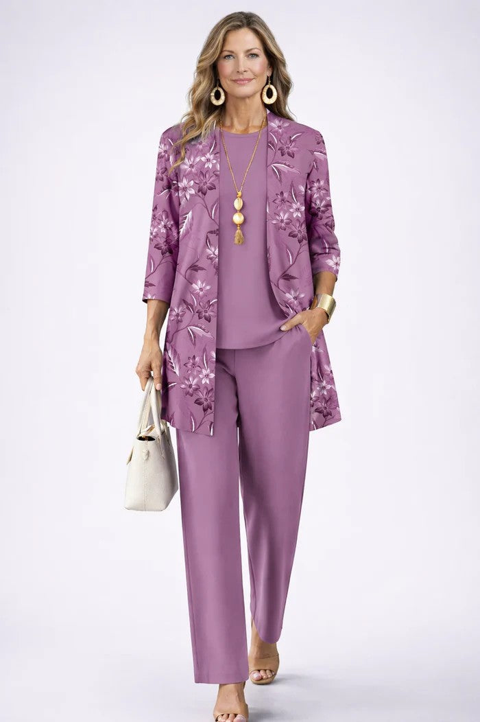 Elegant women's 3-piece set for comfort & style: blazer, top, & relaxed fit trousers. Smart casual fashion.