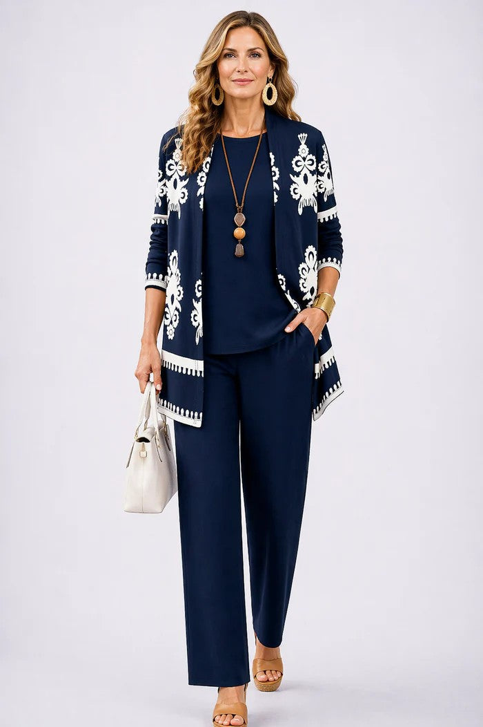 Women's smart casual 3-piece outfit: elegant blazer, sophisticated top, & relaxed trousers. Business-ready style.