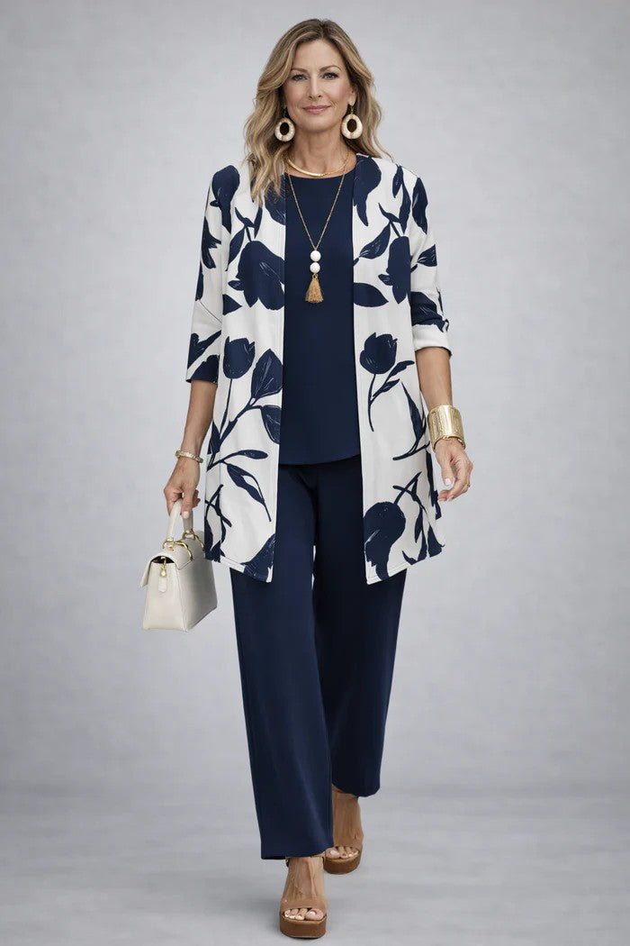 Sophisticated women's coordinated 3-piece set: blazer, top, & relaxed trousers. Perfect for elegant office fashion.