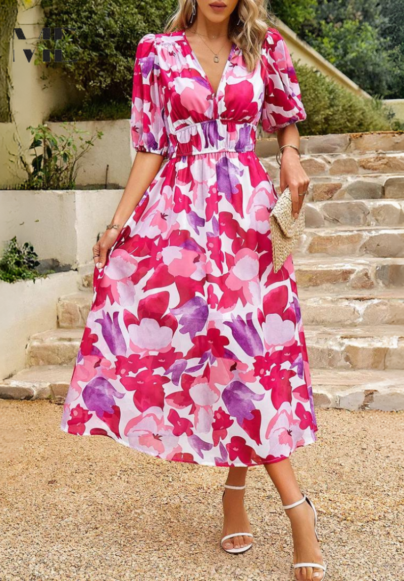 Full length view of women's short sleeve A-line floral midi dress, showcasing its flattering cut.