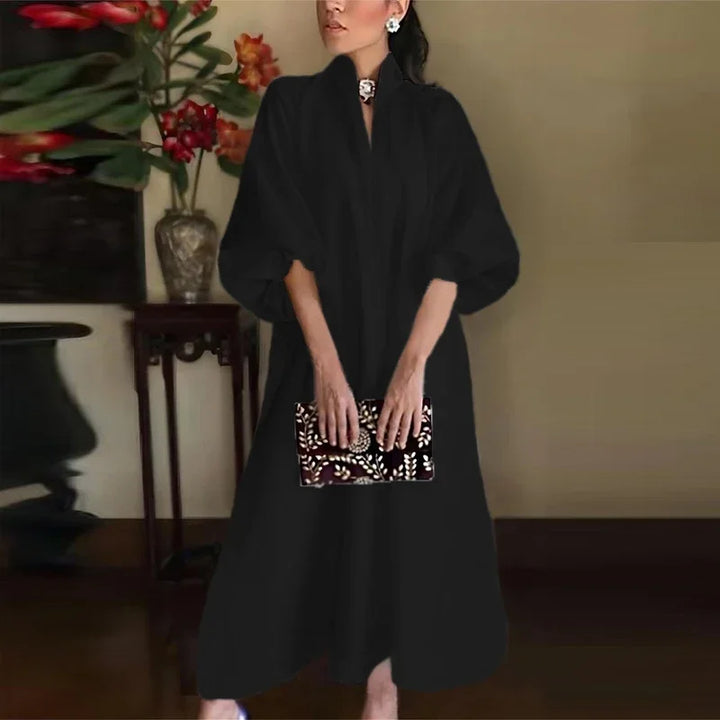 Stunning women's puff sleeve A-line midi dress. Ideal stand collar formal gown for elegant evening & cocktail events.