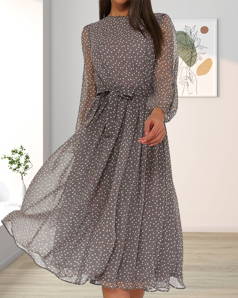 Stylish women's A-line polka dot dress with unique lantern sleeves, offering a chic and versatile look.