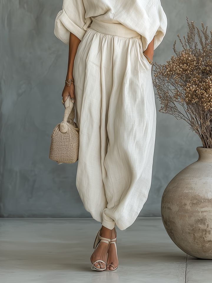 Tapered elastic waist pants from a women's luxury two-piece set, comfortable resort wear ideal for elegant summer outfits.