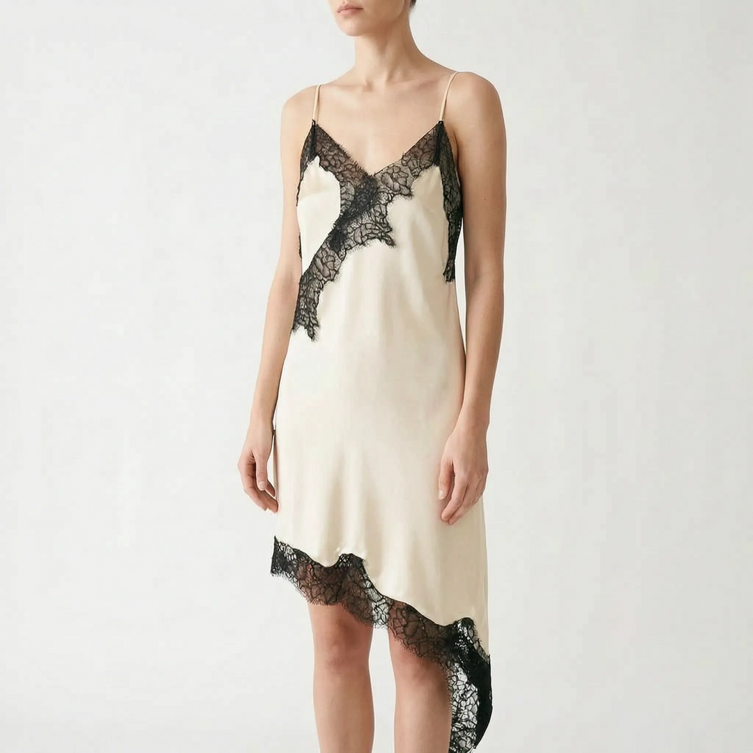 Elegant women's cocktail dress with an asymmetric cut, delicate lace, and a flattering V-neck.