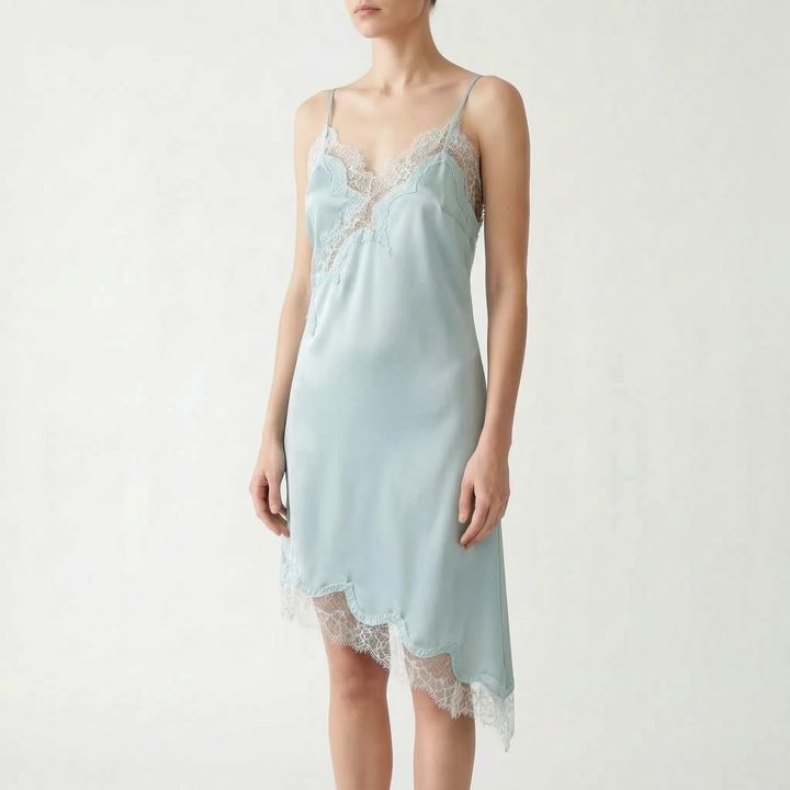 Women's party dress: sleek sleeveless slip design with asymmetric hem & beautiful lace V-neck.