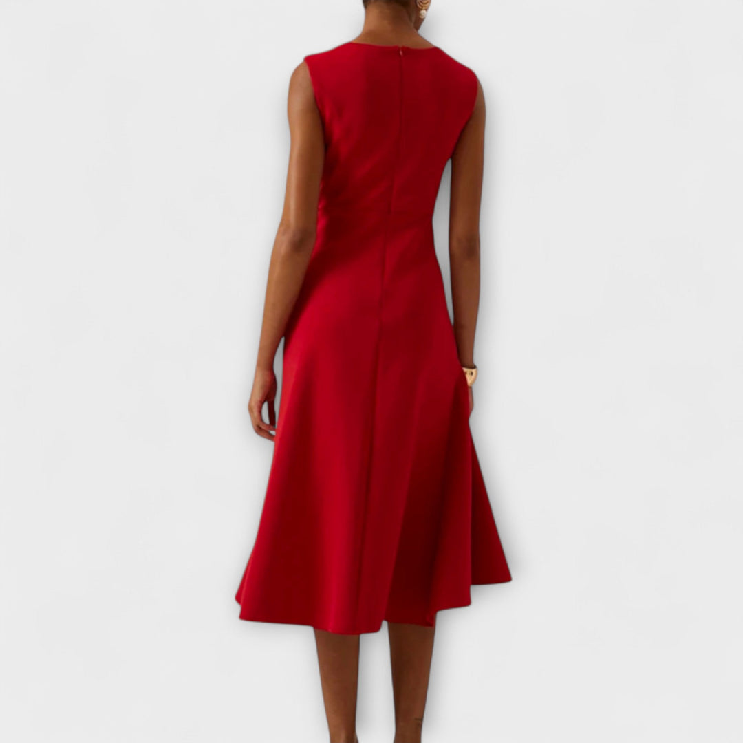 Sleeveless asymmetric midi dress for women, an elegant choice for formal wear or a chic party outfit.