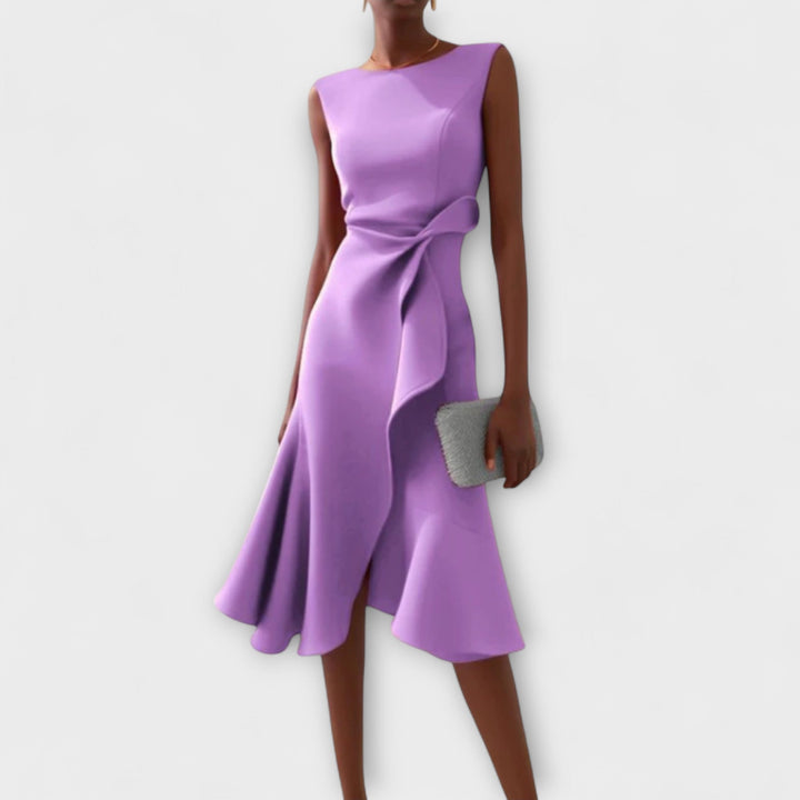 Stylish women's asymmetric sleeveless midi dress, a versatile piece for wedding guests and cocktail events.