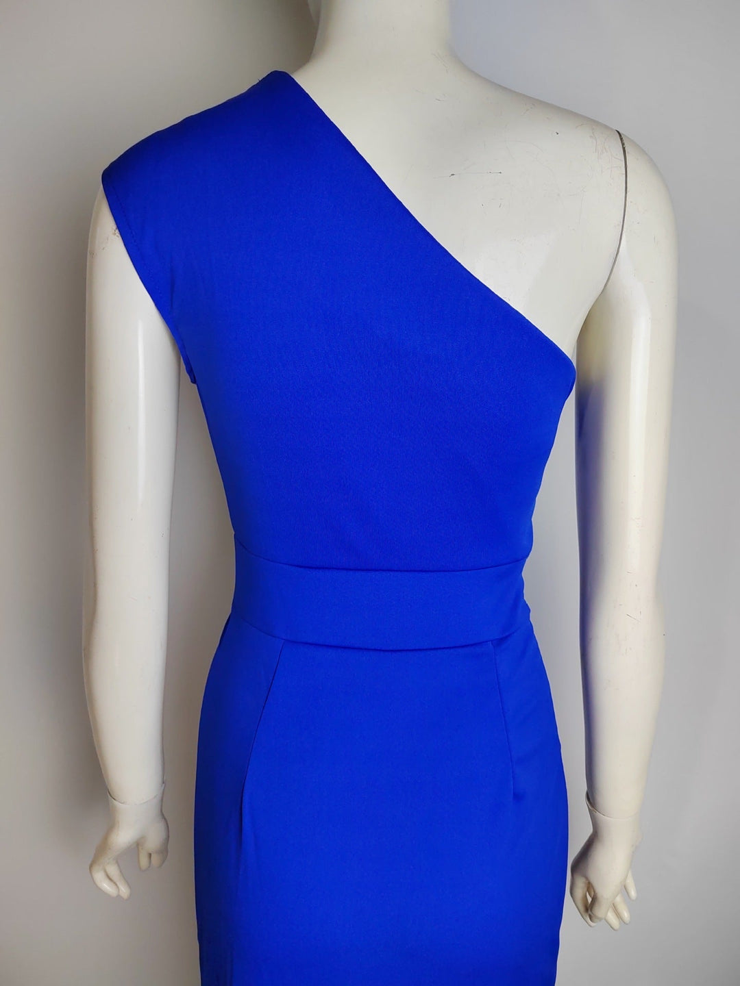 Women's stunning asymmetrical long formal dress with elegant drape, ideal for any special occasion.