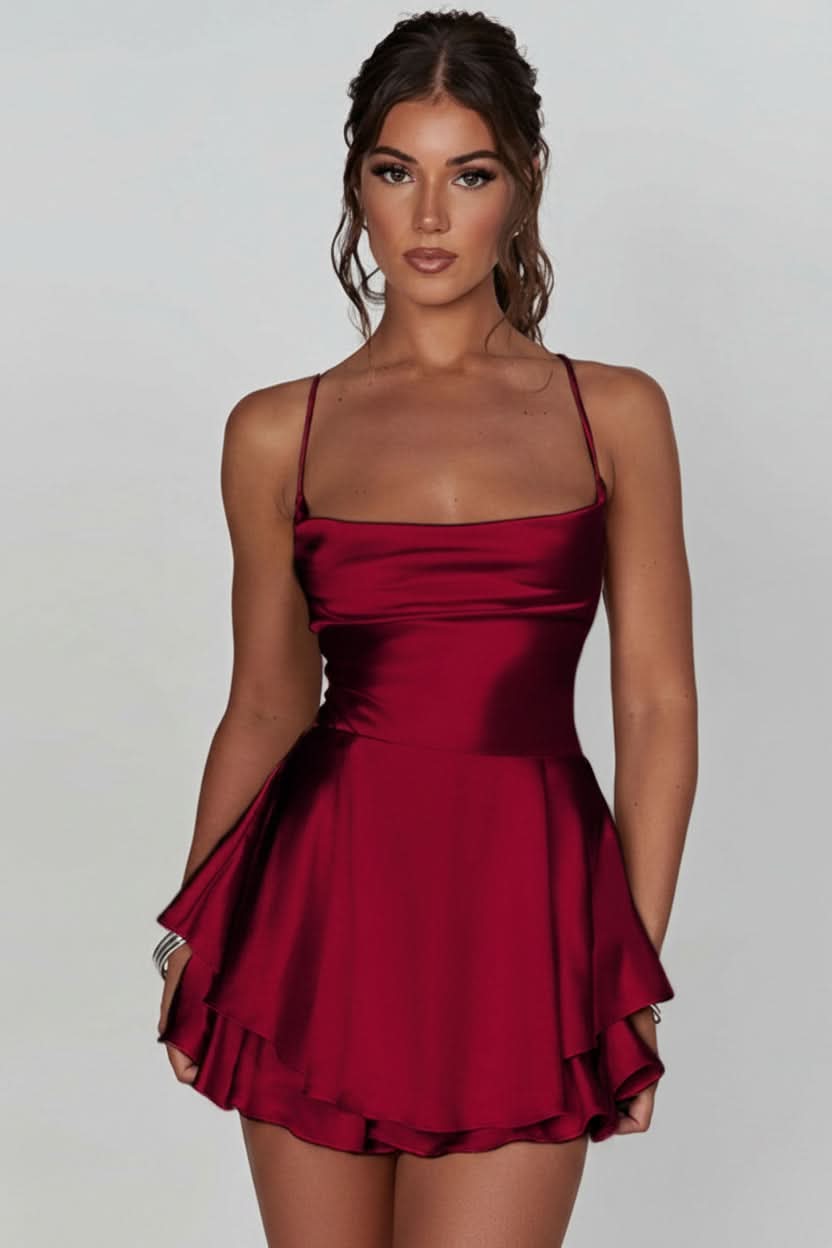 Women's elegant backless halter cocktail dress with flared skirt, perfect for parties & special occasions.