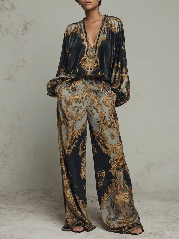 Women's elegant baroque print two-piece set featuring a V-neck top and wide-leg trousers, perfect for resort wear.