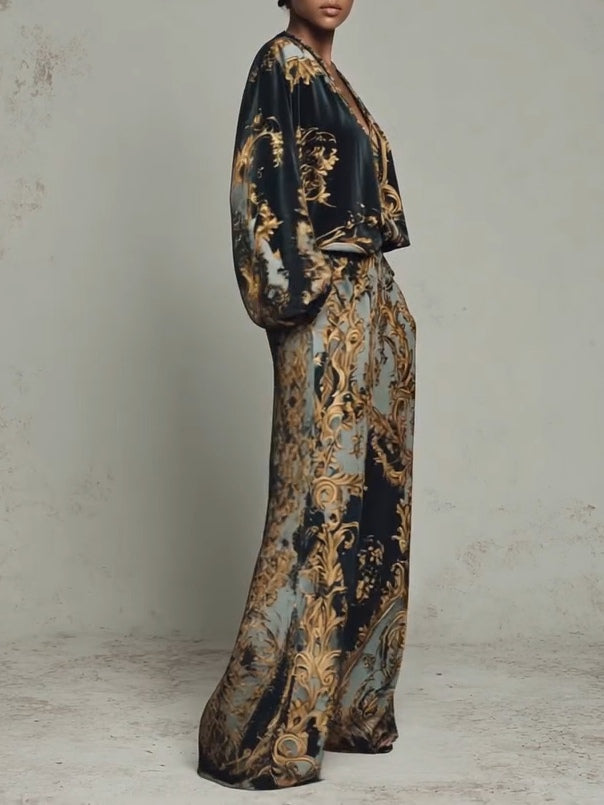 Luxurious women's baroque print set with a V-neck blouse and wide-leg trousers, ideal for evening fashion.