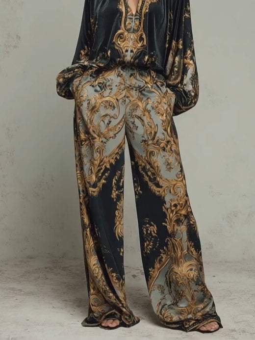 Chic women's resort wear matching set: baroque print V-neck top and relaxed wide-leg pants for sophisticated style.