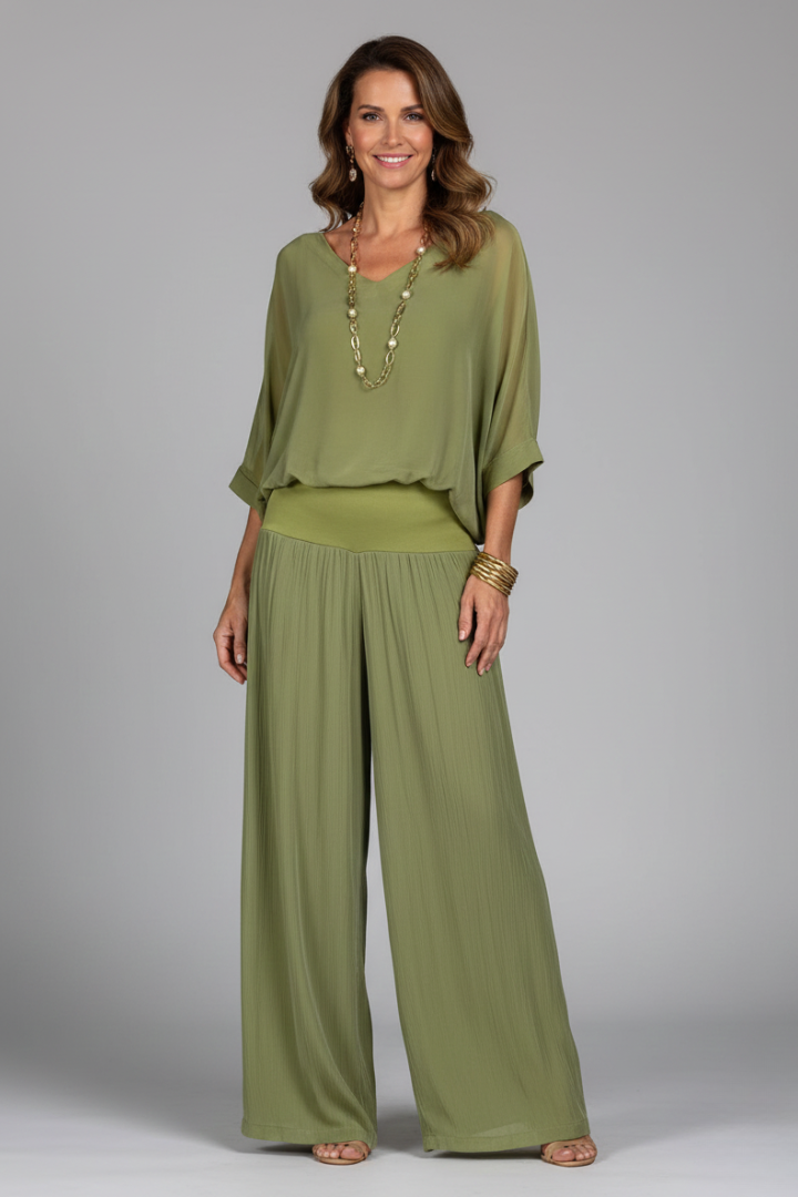 Stylish women's pant set with a flowing batwing top & comfortable wide leg pants. Ideal for summer occasions.