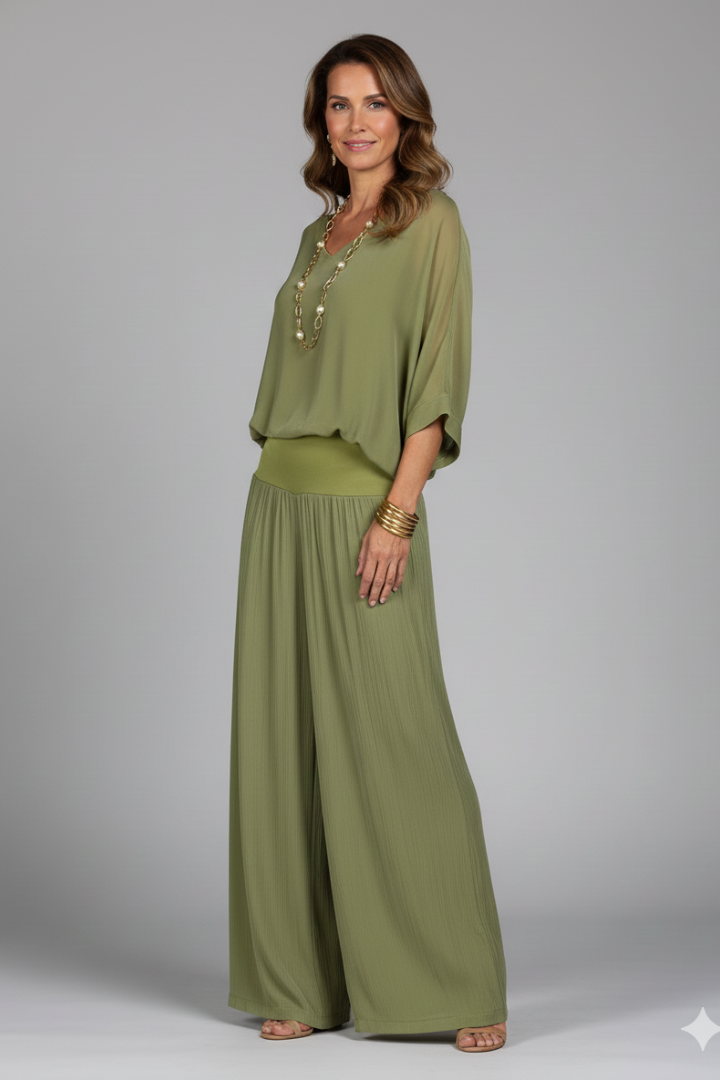 Comfortable & fashionable women's occasion wear: batwing top and wide leg pant set. Great for summer parties.